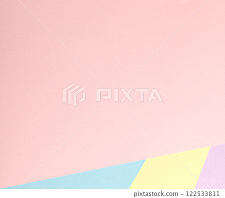 A pastel abstract background with a geometric arrangement of multicolored paper in soft tones, 122533811