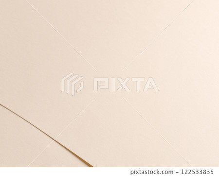 Beige paper background with a smooth, matte texture, exuding a refined and understated elegance. Beige paper background with a smooth, matte texture, exuding a refined and understated elegance. 122533835