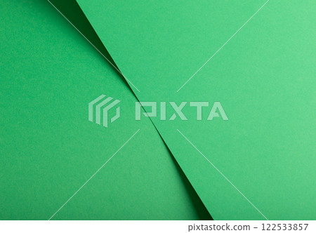 Eden green paper background with diagonal, smooth layers and a fine matte finish. Fresh, saturated Eden green paper background with diagonal, smooth layers and a fine matte finish. Fresh, saturated 122533857