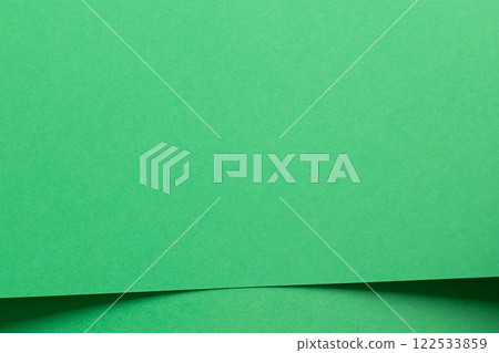 Eden green paper background with smooth, layered sheets and a fine matte finish. Vibrant, fresh Eden green paper background with smooth, layered sheets and a fine matte finish. Vibrant, fresh 122533859