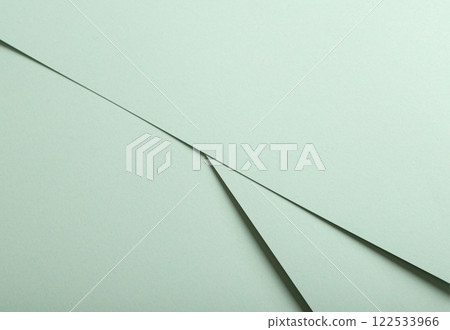 Mint green paper background with a smooth matte surface and soft pastel tones. Delicate and tranquil Mint green paper background with a smooth matte surface and soft pastel tones. Delicate and tranquil 122533966