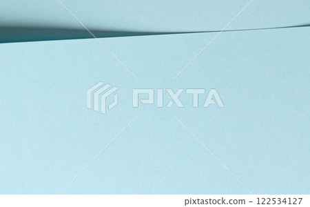 Sky blue paper background with a smooth matte finish and soft pastel tones. Peaceful and serene, it Sky blue paper background with a smooth matte finish and soft pastel tones. Peaceful and serene, it 122534127