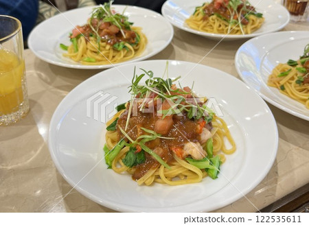 Plate of japanese pasta on table. Plate of japanese pasta on table. 122535611