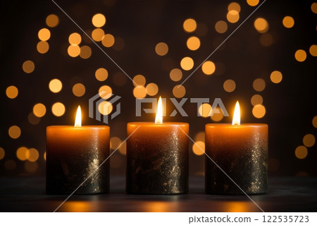 A close-up view of three burning candles set against an black background, evoking a celebration mood an embodiment of the festive concept with ample copy space. Created with generative AI tools 122535723