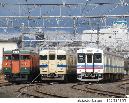 115 series Shonan and Setouchi colors, and 105 series Tricolor color lined up at Shimonoseki General Rolling Stock Depot 122536165