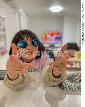 Funky girl with sunglasses 122536294