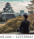 A man gazing at the castle tower 122536642