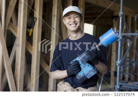 man working at construction site man working at construction site 122537074