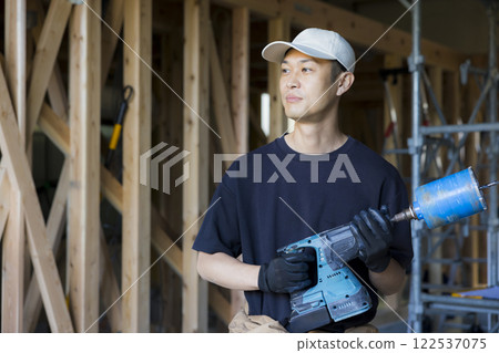 man working at construction site 122537075