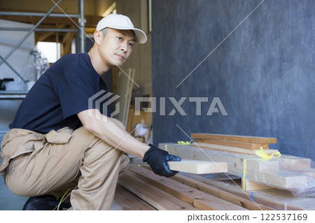 man working at construction site 122537169