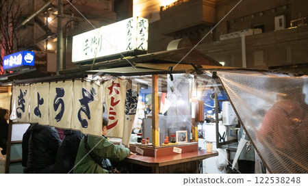 Yatai Food Stalls as a temporary food stalls are set up every evening across the city and draw crowds of locals and visitors Yatai Food Stalls as a temporary food stalls are set up every evening across the city and draw crowds of locals and visitors 122538248