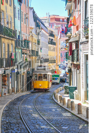 Beautiful scenery of a retro tram running through Lisbon, the capital of Portugal 122539078