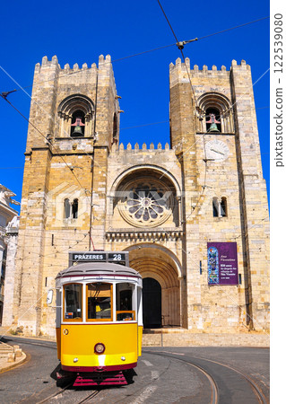 Beautiful scenery of a retro tram running through Lisbon, the capital of Portugal 122539080