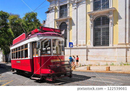 Beautiful scenery of a retro tram running through Lisbon, the capital of Portugal Beautiful scenery of a retro tram running through Lisbon, the capital of Portugal 122539081