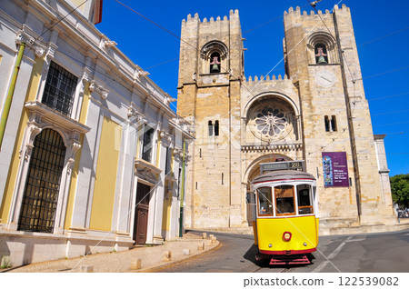Beautiful scenery of a retro tram running through Lisbon, the capital of Portugal Beautiful scenery of a retro tram running through Lisbon, the capital of Portugal 122539082