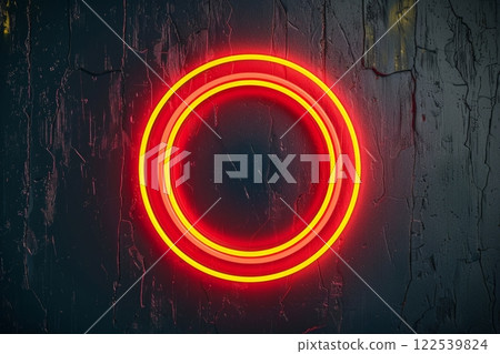 Bright neon circular sign glowing against textured dark wall in an urban setting at night 122539824