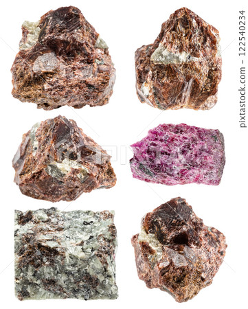 various samples of raw eudialyte minerals isolated various samples of raw eudialyte minerals isolated 122540234