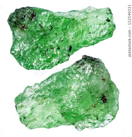 various samples of raw tsavorite minerals isolated various samples of raw tsavorite minerals isolated 122540331