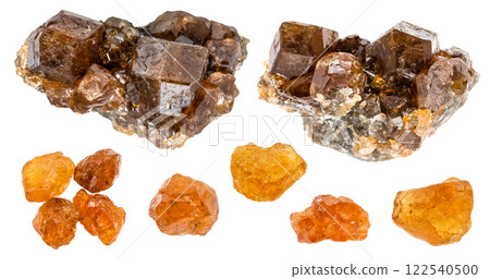various samples of raw hessonite minerals isolated various samples of raw hessonite minerals isolated 122540500