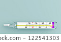 thermometer on a light background. glass medical device for measuring human temperature. 3D illustration 122541303