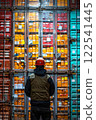 Warehouse worker in front of containers industry logistics distribution supply chain view. 122541445