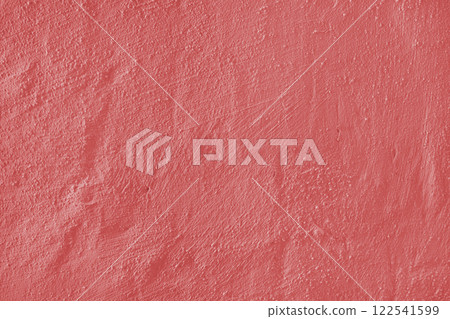 Textured red plaster wall surface with brushstroke, painted, aged concrete background 122541599