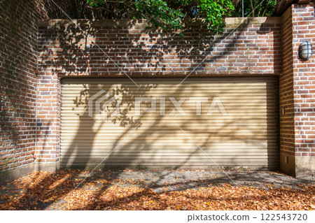 silhouette tree light shade hits house garage in sunny day, Kyoto silhouette tree light shade hits house garage in sunny day, Kyoto 122543720