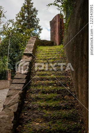 Old staircase and a pink fence, Madeira, Portugal 122543991