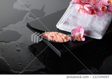 Beautiful blooming orchid flowers and pink sea salt. 122544097
