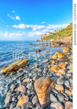 Picturesque spring view on the the cape Milazzo panorama of nature reserve Piscina di Venere. Picturesque spring view on the the cape Milazzo panorama of nature reserve Piscina di Venere. 122544188