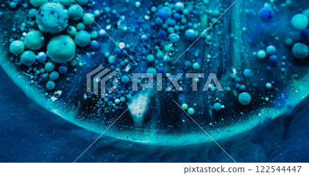 Oil drop paint. Colorful fluid. Art flow layers bubbles dye small particles. Mystical dust blue turquoise liquid abstract background. Oil drop paint. Colorful fluid. Art flow layers bubbles dye small particles. Mystical dust blue turquoise liquid abstract background. 122544447