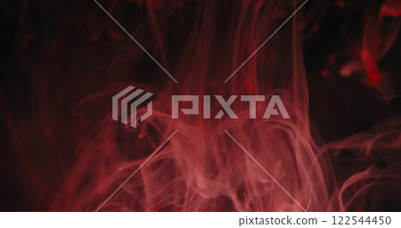 Ink drip blend. Blur paint mix. Defocused pink color shine liquid drops flow fluid smoke texture wave on abstract dark black background. 122544450