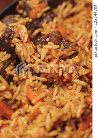 delicious pilaf with beef, beautiful food delicious pilaf with beef, beautiful food 122544704
