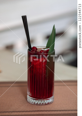 A glass of fresh delicious sangria on the table in 122544713