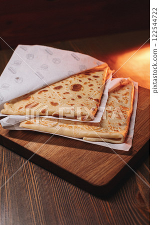 thin pancakes with ham and cheese in an envelope thin pancakes with ham and cheese in an envelope 122544722
