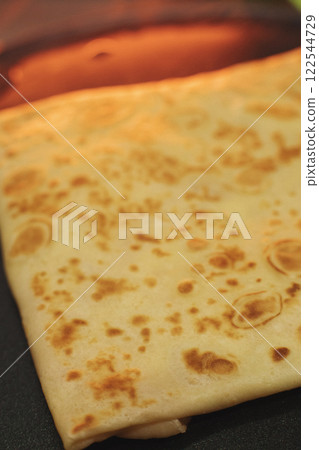 thin pancakes with ham and cheese in an envelope thin pancakes with ham and cheese in an envelope 122544729