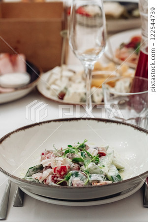 restaurant table setting, banquet, dishes are on restaurant table setting, banquet, dishes are on 122544739