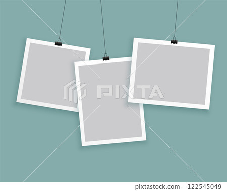 hanging photo frames in different sizes background 122545049