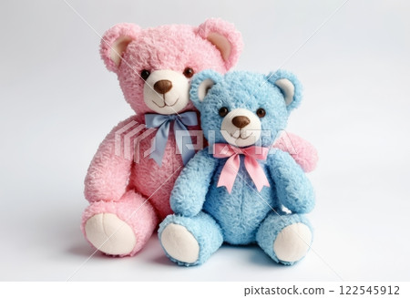 Adorable pink and blue teddy bears with soft fur and cute expressions, perfect for gifting or as decorative pieces in nurseries and children's rooms. Adorable pink and blue teddy bears with soft fur and cute expressions, perfect for gifting or as decorative pieces in nurseries and children's rooms. 122545912