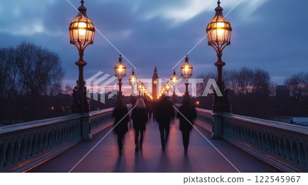 Silhouetted figures on a bridge at dusk. 122545967