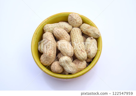 Peanuts, Groundnuts, Goobers in a bowl, Top View, Isolated, White Background Peanuts, Groundnuts, Goobers in a bowl, Top View, Isolated, White Background 122547959