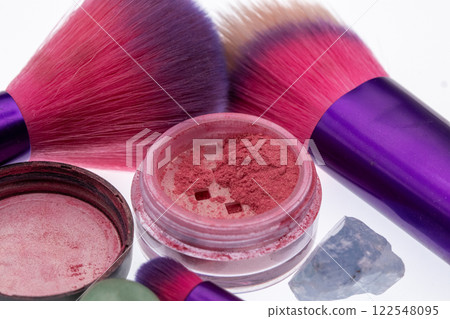 Pink and purple makeup and brushes with crystals  122548095