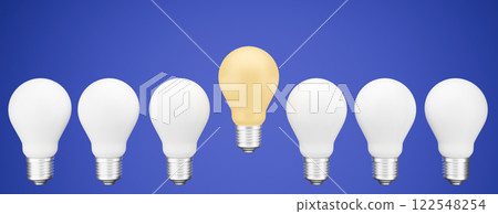 Light bulbs in a line, with one shining uniquely, representing an idea and career concept of standing out. 122548254