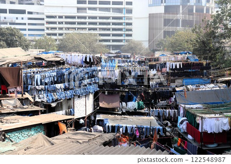 Laundry workshop and skyscrapers, Mumbai, India 122548987