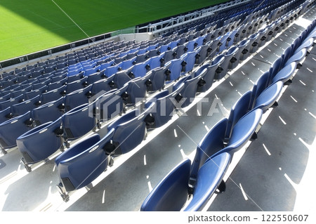 Seats lined up in the stadium 122550607