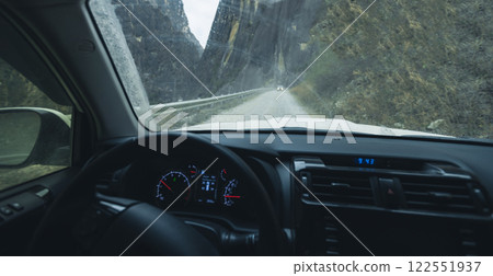 Driving car on the landslide road, China 122551937