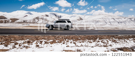 Driving car on the high altitude mountain trail, China 122551943