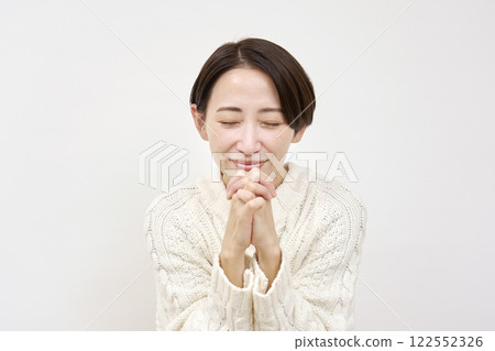 Pleading woman on white background 122552326