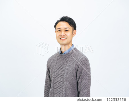 Smiling middle-aged man in casual wear 122552356