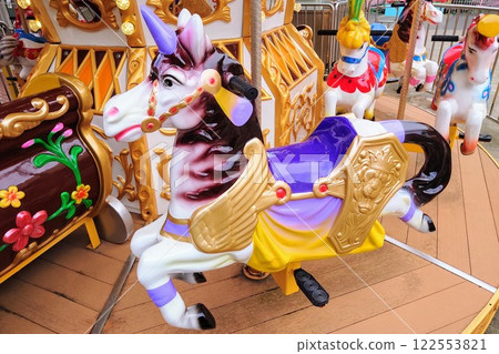 A merry-go-round wooden horse that is very popular with children 122553821